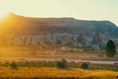 Cappadocia view at sunrise. Travel to Cappadocia background photo. Goreme Nevsehir Turkey.