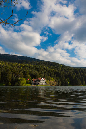 Bolu Golcuk Nature Park and famouse lake house with cloudy sky. Natural beauties of Turkey. Bolu Turkey or Turkey - 5.15.2022のeditorial素材