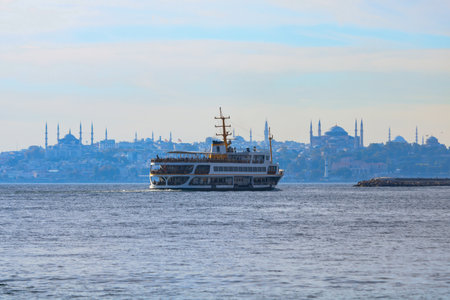 Ferries of Istanbul. A ferry from Kadikoy and Istanbul skyline on background. Travel to Turkey...