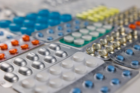 Healthcare concept photo with pills or tablets in the plastic blisters in focus. Various medicines...
