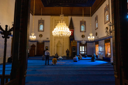 Haci Bayram Veli Mosque and muslim men praying. Ramadan or islamic background photo. Ankara Turkiye - 5.17.2022のeditorial素材