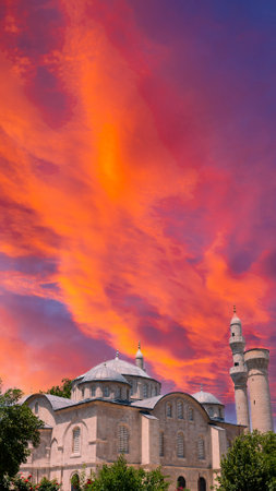 Malatya Teze Cami or New Mosque or Haci Yusuf Tas Mosque and dramatic sky at sunset. Ramadan or islamic concept vertical photo.の写真素材