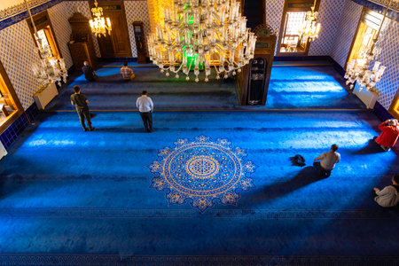 Muslim men praying in the Haci Bayram Veli Mosque. Ramadan or islamic background photo. Ankara Turkiye - 5.16.2022のeditorial素材