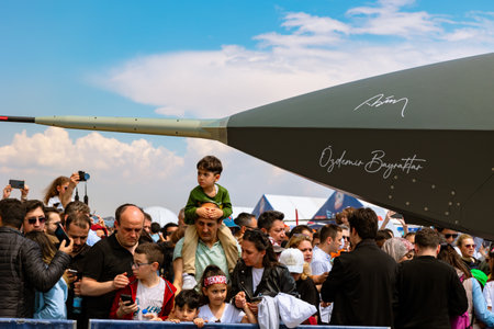 Bayraktar Kizilelma and signatures of Ozdemir Bayraktar and Recep Tayyip Erdogan on the nose with spectators in Teknofest 2023. Istanbul Turkiye - 5.1.2023のeditorial素材