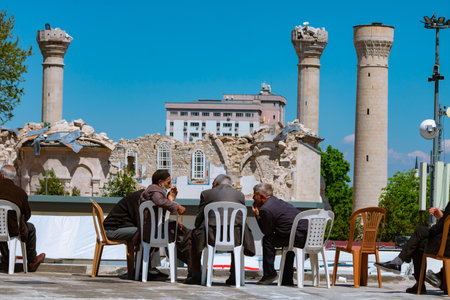 Malatya view with debris of the mosque and local people after the february 6 earthquakes. Malatya Turkiye - 4.25.2023のeditorial素材