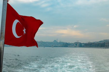 Turkish Flag and cityscape of Istanbul on the background. National days of Turkiye background photo.の写真素材