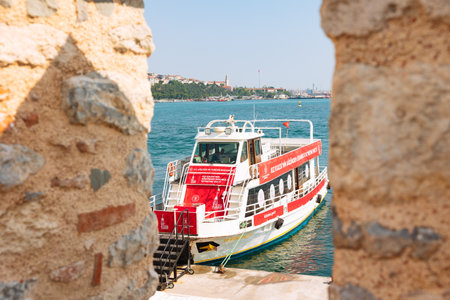 The pessenger boat of Kiz Kulesi aka Maiden's Tower from the building. Travel to Istanbul background photo. Istanbul Turkiye - 7.11.2023のeditorial素材