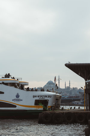 Ferry and Suleymaniye Mosque. Istanbul view. Istanbul Turkiye - 3.4.2023