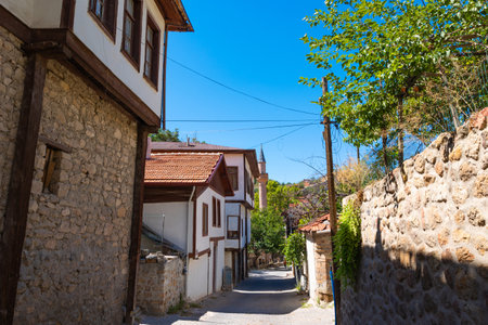 A street of Beypazari district of Ankara. Traditional houses and mosque on the background.の写真素材