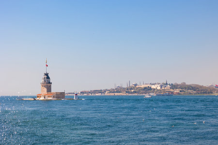 Kiz Kulesi or Maiden's Tower with cityscape of Istanbul at daytime. Visit Istanbul background photo.