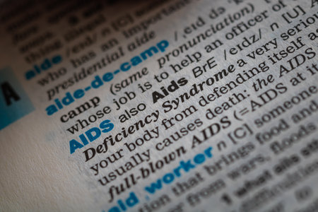 Meaning of AIDS word on the dictionary in focus.