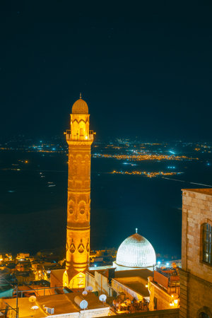 Mardin and great mosque of Mardin view at night in vertical shot.の写真素材