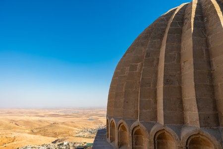 Dome of Zinciriye Madrasa and Mesopotamia view at daytime. Visit Mardin concept photo.