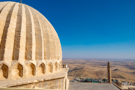 Dome of Zinciriye Madrasa and Mesopotamia view with Great Mosque of Mardin in the background.の写真素材