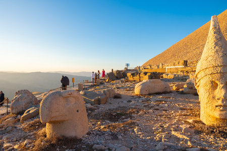 Nemrut mountain national park at sunset. Visit Turkey concept photo. Apollo and Persian Eagle statues.の写真素材