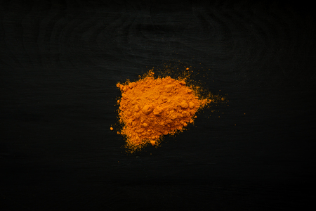 High quality spices isolated photographed on a beautiful dark wood backgroundの写真素材