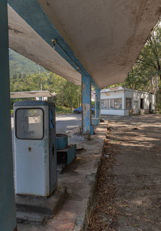 Abandoned gas station. View from central street of Gagra Town, July of 2018, Abkhasia.のeditorial素材