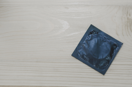 Condoms are placed on the floor.の写真素材