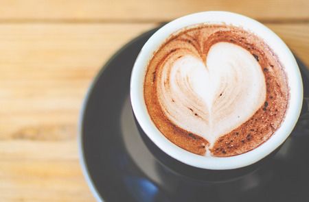 Coffee cup on the table in the cafe.In a cafe with a cup of coffee.Do not focus on objects.の写真素材