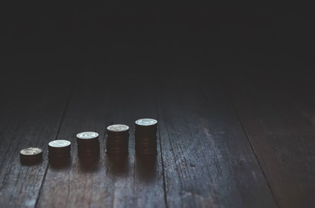 5 rows of coins arranged in ascending orderの写真素材