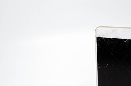 Phone, broken phone or broken screen Place isolated with a white background.の写真素材