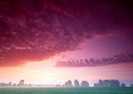 Beatiful and calm sunrise. Colourful landscape.の写真素材