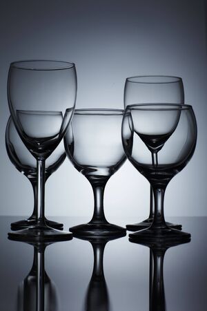 Empty wine glass isolated over backgroundの写真素材