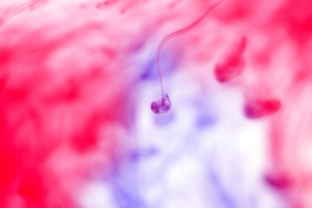 Colored ink splashの写真素材