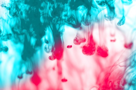 Colored ink splashの写真素材