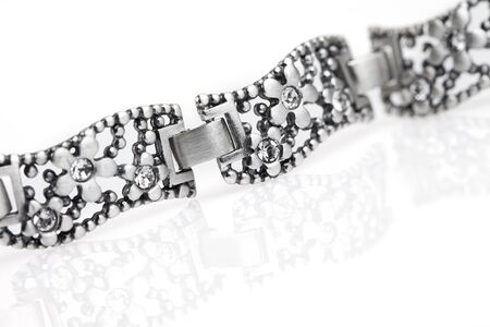 Silver jewelery over backgroundの写真素材