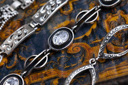 Silver jewelery over backgroundの写真素材