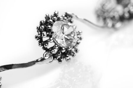 Silver jewelery over backgroundの写真素材