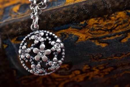 Silver jewelery over backgroundの写真素材