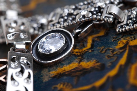 Silver jewelery over backgroundの写真素材