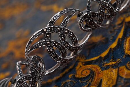 Silver jewelery over backgroundの写真素材