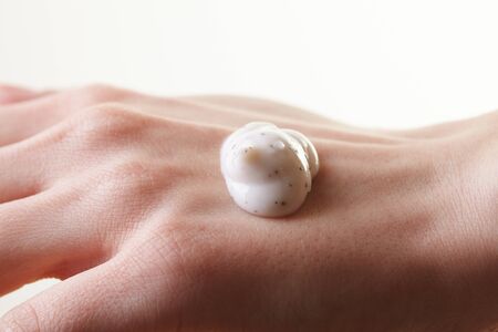 Woman putting creamの写真素材