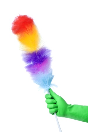 Hand with green glove holding cleaning product; isolated on white の写真素材