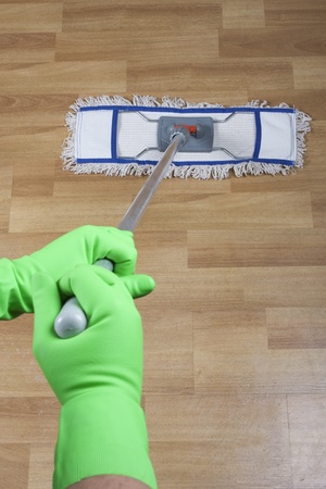 cleaner mopping floor in office の写真素材