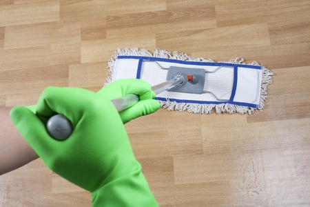 	cleaner is mopping floor