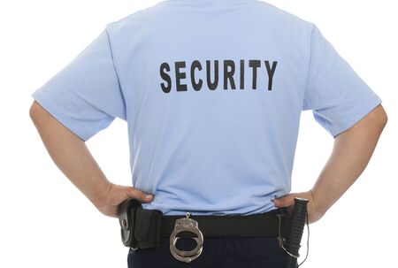 A detail of a security staff member 