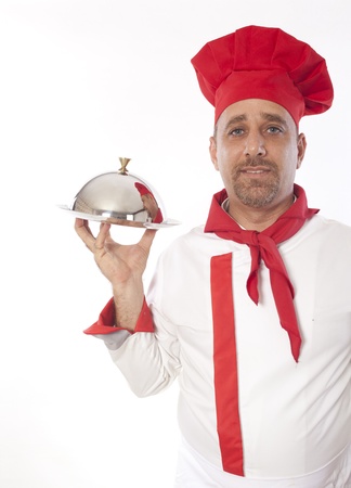 chef with metal cloche lid cover and tray の写真素材