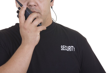 Security guard hand holding cb walkie-talkie radio