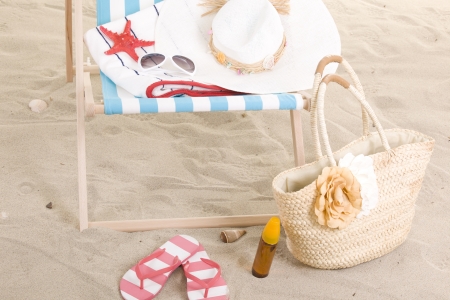 Beach chair in the sandの写真素材