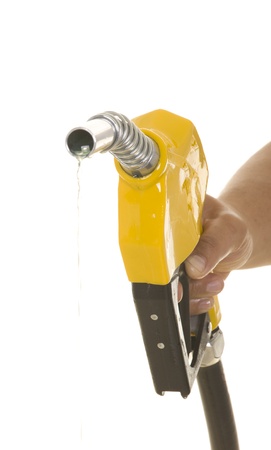 Male hand wasting gas with yellow pump isolated on whiteの写真素材