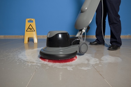 cleaning floor with machine