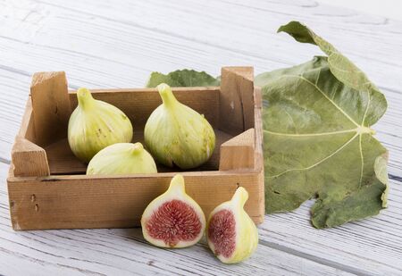 figs on wooden back groundの写真素材