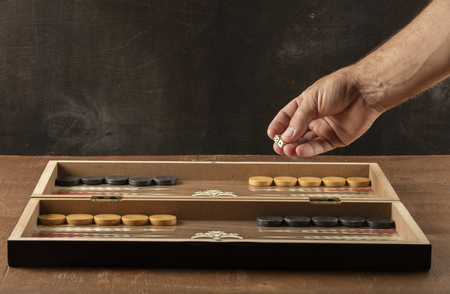 detail of a backgammon game with two dice close up