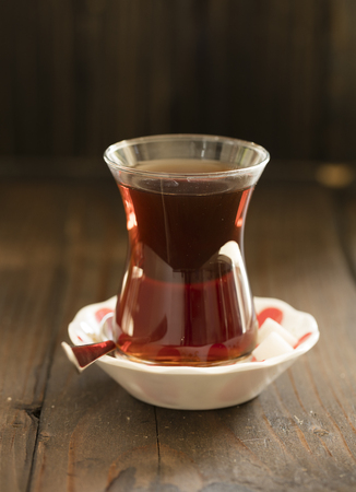 turkish tea with authentic glass cup on dark back groundの写真素材