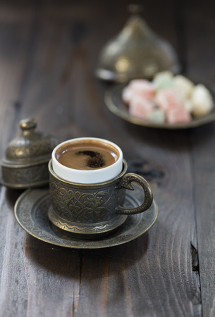 turkish coffee and turkish delights on wooden back groundの写真素材