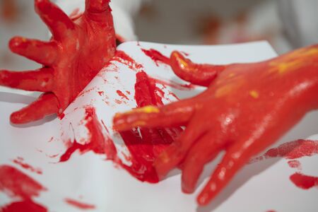 Child Finger Painting at home  On Paper at covid time . stay at homeの写真素材